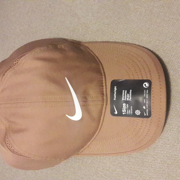 Nike Accessories - Nike women's feather light dri fit hat